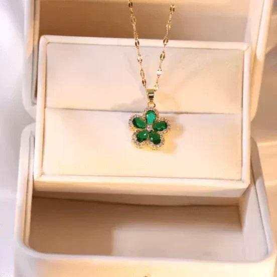 emerald zircon flower pendant set